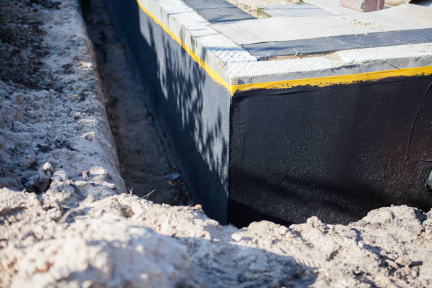 Professional Waterproofing technician working in Walland, TN